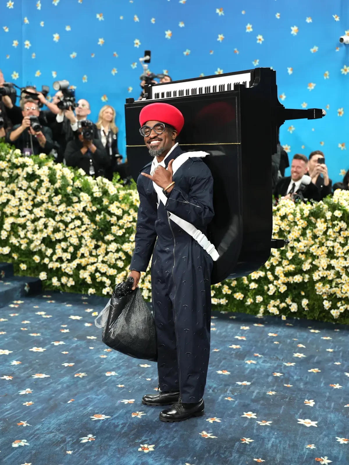 Andre 3000 Carries Piano on His Back at 2025 Met Gala & Drops New Piano Album at the Same Time